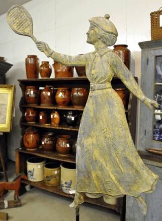 The top lot of the day was the full-bodied molded copper female tennis player in Victorian attire that sold for $23,000.