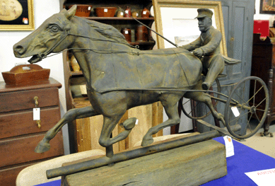 The horse and sulky vane by Harris sold at $17,325. 