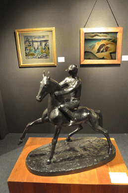 The Hunt Diederich bronze "The Jockey†was $95,000 at Gerald Peters Gallery, New York City. The John Marin watercolor, rear left, was $130,000, while the Thomas Hart Benton oil on canvas double-sided painting, "Seascape, Martha's Vineyard†and "Abstract Landscape,†both circa 1920, was $475,000.
