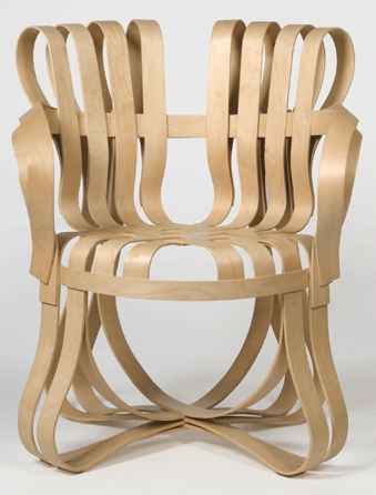 The "Cross Check†armchair was designed between 1989 and 1991 for Knoll and made of bent and laminated maple in a ribbonlike bifurcation. 