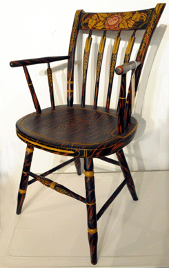 "Its an explosive combination,†said auctioneer Tim Gould in regard to all of the factors surrounding a rare pair of paint decorated Maine arrow back armchairs. Color, rarity and condition all came together for a healthy price of $24,200.