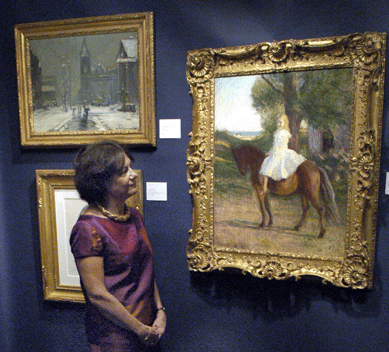 Debra Force, Debra Force Fine Art, New York City, with "Girl on a Pony†by Boston painter Edmund Tarbell (1862‱938), oil on canvas, 30 by 25½ inches.