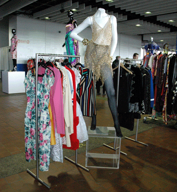 Joe Sundlie's Vintedge, New York City, offered hot fashions like the 1980s jewelry "dress†by David Mandel, shown foreground, and an Yves St Laurent sarong from the 1970s in 100 percent silk on the rear mannequin.