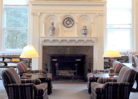 There are no closeup views of the stolen antique porcelain plate available. This image shows the 14-inch diameter plate as it was displayed, mounted above the fireplace in the reading room of the Phoebe Griffin Noyes Library in Old Lyme, Conn.