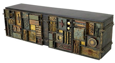The top lot for Paul Evans was an outstanding wall-hanging, sculpture-front cabinet that sold in house for $72,000.