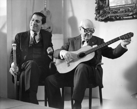 Philippe de Montebello in the galleries with Andres Segovia, on the occasion of three of Segovia's guitars being donated to the museum. ⁒ichard Lombard photo, 1986