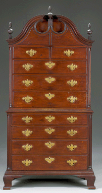 Morrison H. Heckscher, chairman of the museum's American Wing, expresses particular pleasure in the 2005 acquisition of a handsome chest-on-chest, 1772, made by noted colonial Newport cabinetmaker Thomas Townsend. "The design, with flanking fluted quarter columns and a scroll pediment top enclosing paired circular blind openings, is characteristic of the best Newport work,†says Heckscher.