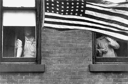 Robert Frank (b 1924), "Parade †Hoboken, New Jersey,†1955, gelatin silver print, 11 by 14 inches. Private collection, San Francisco. ©Robert Frank 