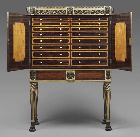Cabinet on stand, London, about 1805, attributed to James Newton (English, 1773‱821), oak, pine and mahogany, veneered with satinwood, rosewood, tulipwood, ebony and boxwood, partially ebonized and gilded; ivory, and brass. Museum of Fine Arts, Boston, gift of Horace W. Brock in honor of G. Peabody Gardner Jr. ⁐hotograph ©Museum of Fine Arts, Boston