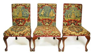 A set of six English or Irish Georgian walnut side chairs (three shown) sold to a Michigan buyer for $19,550.