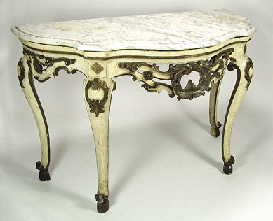 One of the Eighteenth Century Italian rococo pair of carved and painted consoles that sold for $15,540.