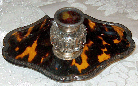 The tortoiseshell inkwell had sterling marks from Birmingham, England, circa 1880, offered by Israel Levin, Brooklyn, N.Y.