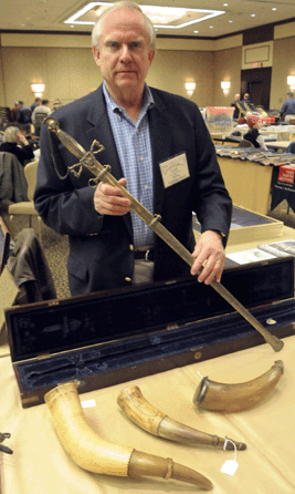 Dave Kleiner with an "exceptional silver gilt cased presentation sword,†Mexican War era, that had been presented to Lieutenant Nathan Beakes Rossell for bravery and was accompanied by five Presidential US Army commissions executed by Martin Van Buren, James Polk and Abraham Lincoln. Concerning the last commission, Rossell was killed in action during the Civil War.  