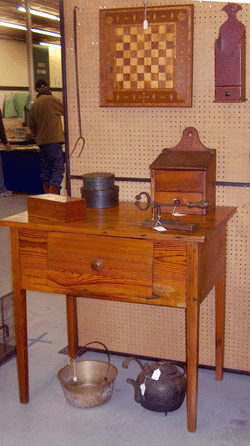 The Georgia hunt board in yellow pine was offered by Queen Street Antiques of Tappahannock, Va.