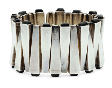 This matchstick bracelet is set with obsidian tips.