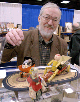 Peter Boody shows off his collection of vintage toys at Barbara E. Smith's, Northampton, Mass.