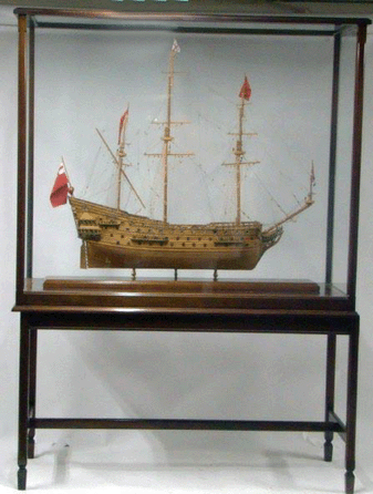A planked model of the English first rate ship of the line HMS Prince, launched in 1670, was complete with its 100 guns and sold for $1,840. 