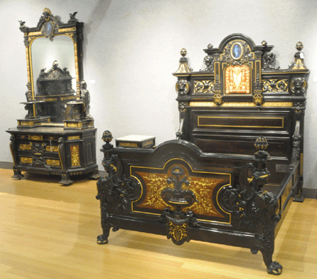The Herter Brothers American Renaissance carved, inlaid and ebonized bed, originally commissioned for Milton Slocum Latham's Thurlow Lodge, became the top lot of the auction as it sold for $326,000. The inlaid and carved ebonized mirrored dresser brought $103,700, and a pair of night stands realized $23,180. All three lots were claimed by New Orleans-area collectors Judy and Max Foote.