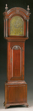 The Chippendale block and shell carved cherry tall case clock by Squire Millerd sold at $47,500. 