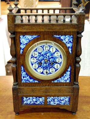 A Continental, maybe Dutch, clock from Boston dealer Peter D. Murphy had painted enamel panels, French works, an oak case by Jacques Revially (that may have been incised later) and bore the partial label of an English retailer. It had an exquisite chime and attracted much attention.
