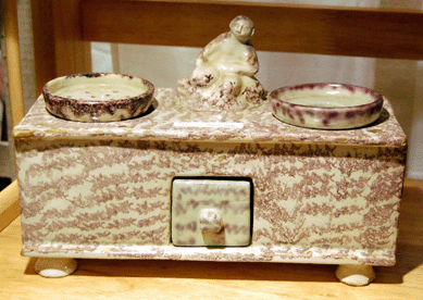 An early tin glazed ink stand that may have been Continental was available from Thymes Remembered in Alstead, N.H.