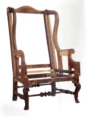 This transitional Boston William and Mary to Queen Anne-style Spanish foot maple easy chair, one of 12 known from a group of "sawn cabriole leg†examples described by Robert Trent, sold to Atlanta dealer Deanne Levison for $218,500 ($100/150,000).