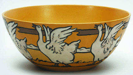 A fanciful bowl with stylized geese, executed 1914, Saturday Evening Girls, probably designed by Edith Brown, executed by Fannie Levine, diameter 11 5/8 inches. Several variant designs with strutting and swimming geese were produced. In some instances, they walk quietly; here, the seven geese all squawk and flap their wings, each somewhat differently. 