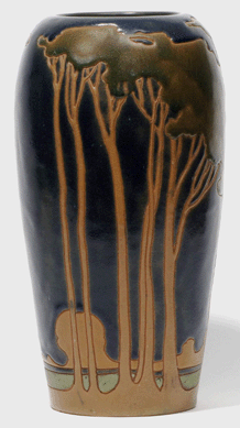 The impact of Arthur W. Dow's teachings is particularly evident in this iconic vase. Rhead Pottery vase with a design of a stylized landscape, circa 1914‱7. Designed and executed by Frederick Hurten Rhead, glazed earthenware; height 11¼ inches. Purchased by the Two Red Roses Foundation in 2007, this vase still holds the record price paid at auction of more than $500,000. 
