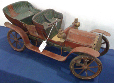 Circa 1911 Converse painted tin touring car, clockwork, steerable, $1,400 at Roger and Fran Sandlin, Newark, Del. 