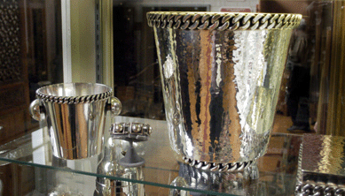 Figural silver pieces by Jean Despres for the bar and desk were eye-catching at Sooky Goodfriend, New York City.