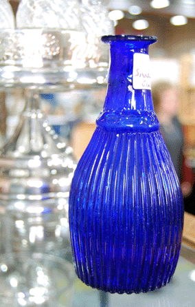 Camille Buda and Matt King of Sandwich, Mass., had a hand blown Sandwich glass fluted toilet water bottle in an ethereal blue.