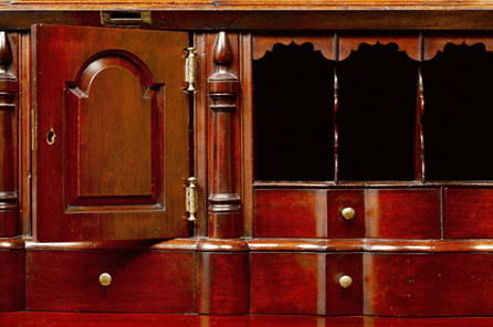 It was Gould's habit to use clock hinges for prospect doors as evinced by the detail view of the desk-and-bookcase at the Metropolitan Museum of Art.