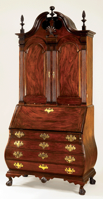 Gould's bombé desk-and-bookcase descended in the Robert Treat Paine II family and is now in a private collection, having come to auction and purchased by C.L. Prickett for a client.