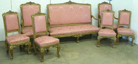 A French seven-piece giltwood parlor suite, circa 1860, made $8,555. 