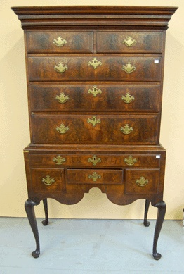 The Russell family Massachusetts Queen Anne burl walnut high chest brought $55,575.