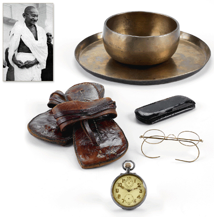 Mahatma Gandhi's pocket watch, later given to his grandniece, Abha Gandhi. Accompanied by Gandhi's sandals, bowl, plate, glasses, images of Gandhi and letters of authenticity from Gita Mehta, Talatsahid Khan Babi and Professor Lester Kurtz. The watch is a Zenith, movement No. 421357, case No. 49529, circa 1910. The Gandhi lot realized $2,096,000.