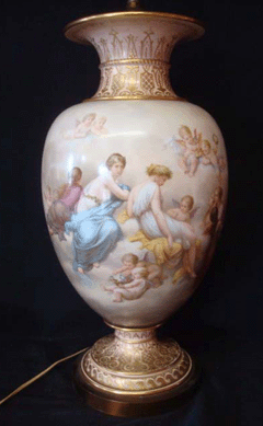 This Royal Vienna porcelain vase decorated with muses and putti, hand signed by the artist, had been converted into a lamp. Estimated at $800․1,200, it realized $7,050.