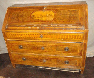 An Eighteenth Century Italian slant front desk brought $5,288. 