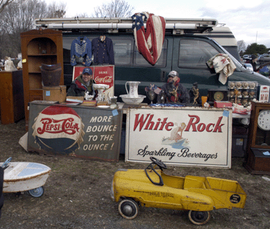 Tod Shamock, Meriden, Conn., offered a bit of the red, white and blue, courtesy of vintage cola signs and the American flag.