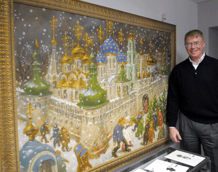Trinity International's Stephen Gass with the Vasily Sitnikov painting, "Kremlin in a Snowstorm,†that sold to a phone bidder from Texas for $80,662.