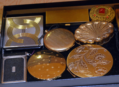 Queen Ann's Lace, Prospect, Conn., had a case of gorgeous compacts from Art Deco to Modern.