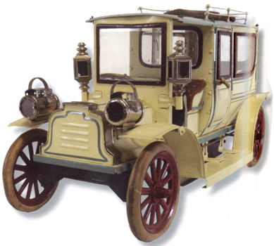 A large clockwork-driven Carette limo in cream with blue accents, measuring 16 inches in length, saw a flurry of bids, selling at $39,100.