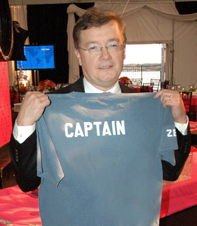 At a reception given by the trustees of Historic Deerfield prior to the dinner, Philip Zea was presented with a T-shirt making him the official Captain of Historic Deerfield.