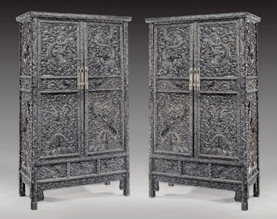 This large pair of carved Zitan storage cabinets fetched $48,400.