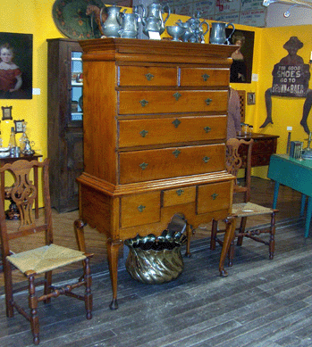Boulting House Antiques and Hall Antiques, both from Midway, Ky., were sharing a booth to show their combined collection of early furniture and folk art.