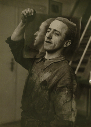 Bohumil astn, "The Glazier (Prague),†1934, gelatin silver print, 7 1/16 by 9 inches framed, private collection.