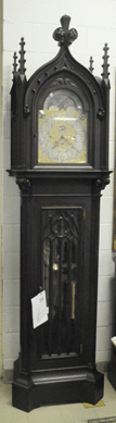 A private buyer, a doctor from Maryland, was the high bidder at $10,350 for the Walter Du-free nine-tube, ornate Gothic-style tall case clock marked Tiffany.  