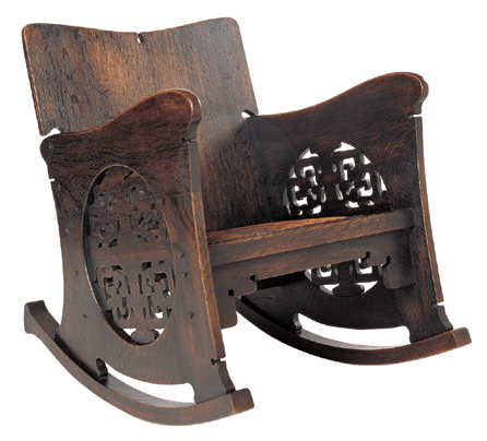 Charles Rohlfs (American, 1853‱936), rocking chair, circa 1899; oak, leather, and metal tacks; 32½ by 24¾ by 33 inches. The Huntington Library, Art Galleries, promised gift of American Decorative Art 1900 Foundation in honor of Joseph Cunningham. ₩V&A Publications photo