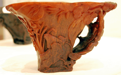 A Seventeenth or Eighteenth Century carved rhinoceros horn libation cup brought $59,250.