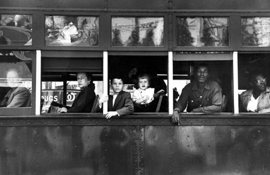 In a photograph that sums up many of his findings on his tour of America, in "Trolley †New Orleans,†1955, Frank showed that the nation had not yet lived up to its stated commitment that "all men are created equal.†As Greenough notes, the trolley is "hierarchically segregated&⁛with] the subjects&⁲igidly separated by race, gender and age, as well as the physical environment itself&‮†Susan and Peter MacGill. ⁐hotograph ©Robert Frank, from The Americans